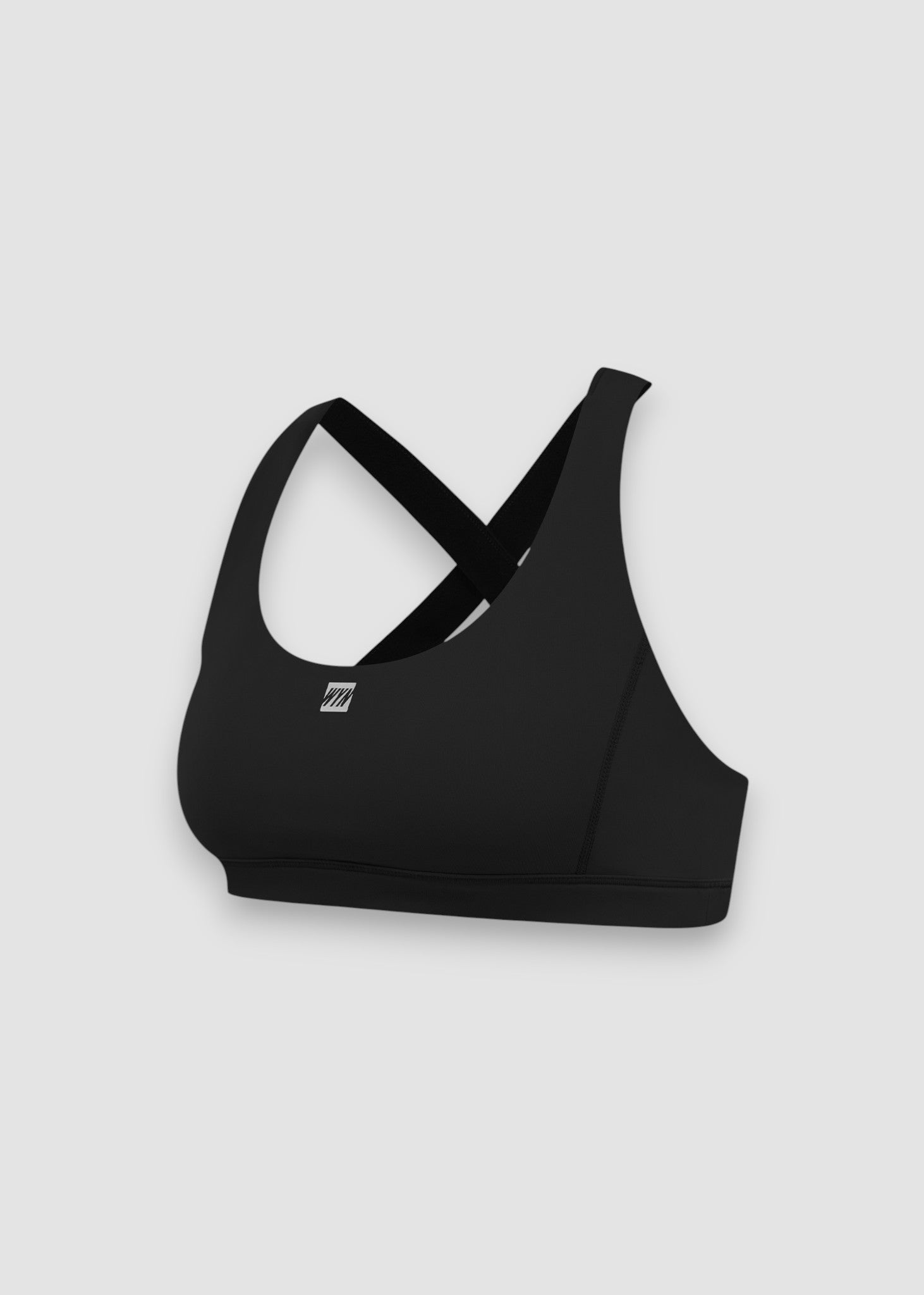 black sports bra with a brand logo on a light gray background